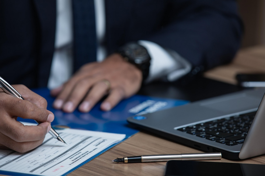 contract signing legal document pen
