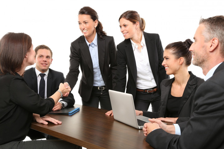 law firm handshake office meeting